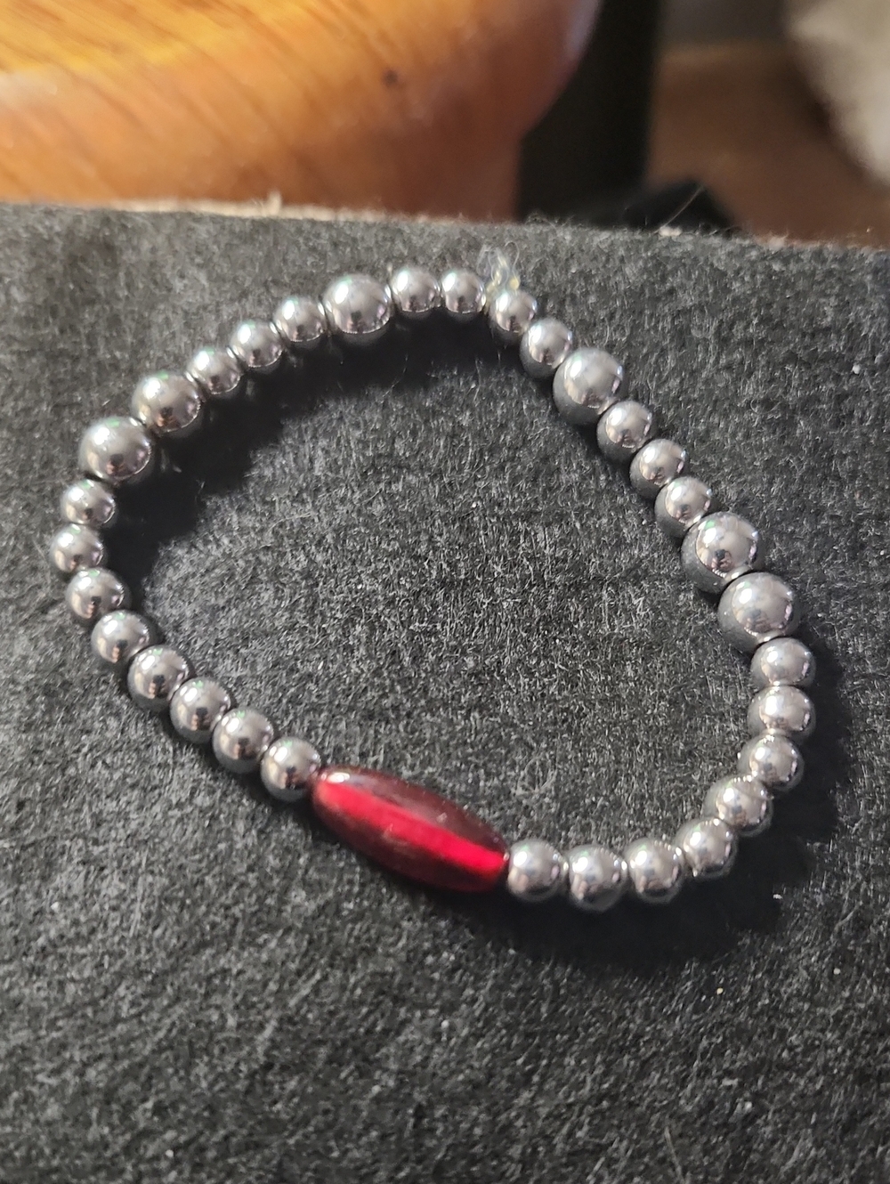 Hand Crafted Silver Beaded Bracelet with Red Accent